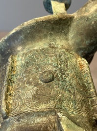 Three Chinese archaic bronze wine vessels, Zhou or later