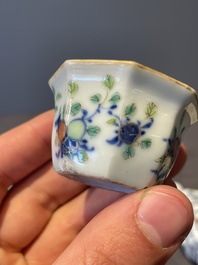 A Chinese blue, white and famille rose tea service, three famille rose bowls, a plate and a covered jar, 19th C.