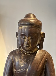 A Burmese lacquered and gilt wooden Buddha, 17/18th C.