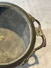 Two Chinese Chinese bronze cylindrical incense stick holders and a covered censer, Yuan/Ming and Qing