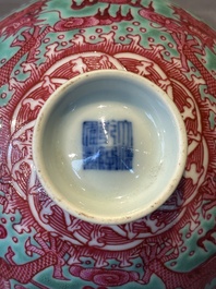 A Chinese puce-enamelled green-ground 'dragon' bowl, Qianlong mark, 19/20th C.