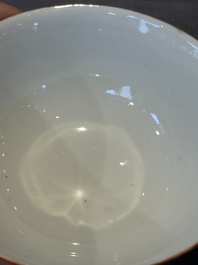 A Chinese coral-red-glazed bowl with reverse-decorated bamboo design, Xuantong mark and of the period