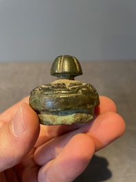 A varied collection of five Chinese bronze objects, 4th C. B.C./15th C.
