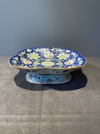 A Chinese blue, white and famille rose tea service, three famille rose bowls, a plate and a covered jar, 19th C.