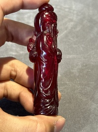 A group of seven Chinese red-overlay glass and red glass snuff bottles, 19/20th C.