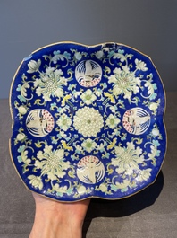 A Chinese blue, white and famille rose tea service, three famille rose bowls, a plate and a covered jar, 19th C.