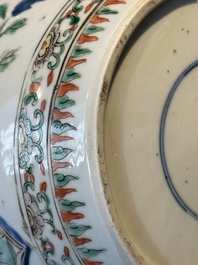 A Chinese famille verte 'figures and antiquities' jar and cover, Kangxi