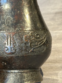Four Chinese archaistic gilt bronze vases, Yuan/Ming