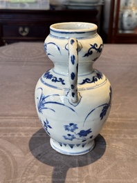 A Chinese blue and white vase with floral design and two handles, Transitional period