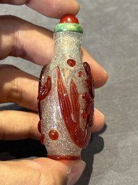 A group of seven Chinese red-overlay glass and red glass snuff bottles, 19/20th C.