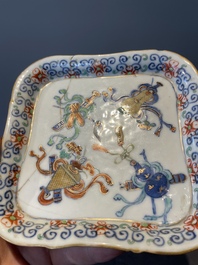 A Chinese blue, white and famille rose tea service, three famille rose bowls, a plate and a covered jar, 19th C.