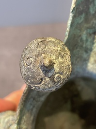 Three Chinese archaic bronze wine vessels, Zhou or later