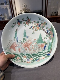 A Chinese famille verte 'leaping carps' dish, artemisia leaf mark, Kangxi