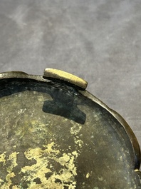 A Chinese bronze tripod censer with cover and stand, 19th C.
