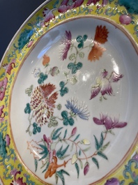 A Chinese blue, white and famille rose tea service, three famille rose bowls, a plate and a covered jar, 19th C.