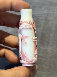 A group of six Chinese overlay glass snuff bottles, 19th C.