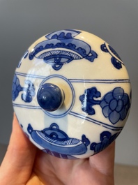 A Chinese blue and white vase, a covered bowl and six saucers, Chenghua and artemisia leaf mark, Kangxi