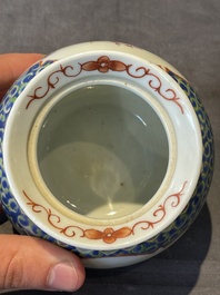 A Chinese blue, white and famille rose tea service, three famille rose bowls, a plate and a covered jar, 19th C.