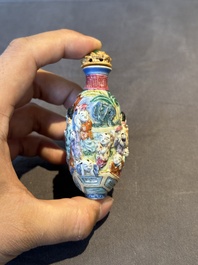 A Chinese famille rose moulded snuff bottle, Qianlong mark, late 18th/early 19th C.