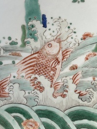 A Chinese famille verte 'leaping carps' dish, artemisia leaf mark, Kangxi