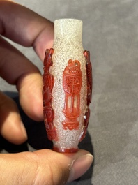 A group of seven Chinese red-overlay glass and red glass snuff bottles, 19/20th C.