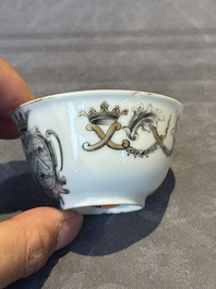 A Chinese gilt-decorated grisaille armorial cup and saucer, Qianlong