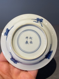 A Chinese blue and white vase, a covered bowl and six saucers, Chenghua and artemisia leaf mark, Kangxi