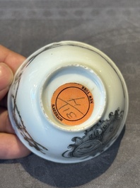 A Chinese gilt-decorated grisaille armorial cup and saucer, Qianlong