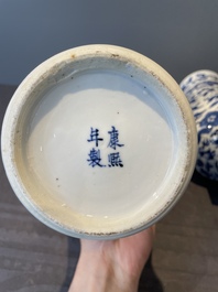 A Chinese blue and white garniture of five vases with lotus scrolls, 19th C.
