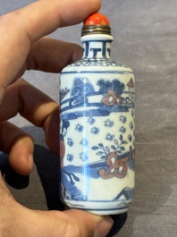 A Chinese blue, white and copper-red snuff bottle, Kangxi mark, 19th C.