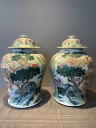 A pair of Chinese famille rose 'hundred boys' vases and covers on wooden stands, 19th C.