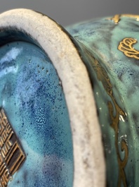 A pair of Chinese robin's egg and faux bronze-glazed 'hu' vases, Qianlong mark, 19th C.