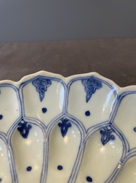 A rare Chinese lotus-shaped blue and white 'fu' dish, Kangxi mark and of the period