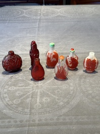 A group of seven Chinese red-overlay glass and red glass snuff bottles, 19/20th C.
