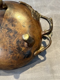 Two Chinese Chinese bronze cylindrical incense stick holders and a covered censer, Yuan/Ming and Qing