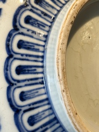 A Chinese blue and white 'lotus scroll' bottle vase, 18/19th C.