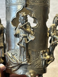Two Chinese Chinese bronze cylindrical incense stick holders and a covered censer, Yuan/Ming and Qing