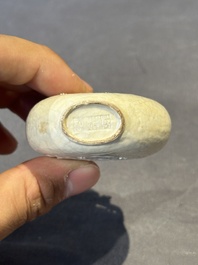 A rare Chinese monochrome ge-type 'chilong' snuff bottle with jadeite stopper, Qianlong mark and of the period