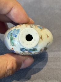 A Chinese famille rose '18 Luohan' snuff bottle, Daoguang mark and of the period