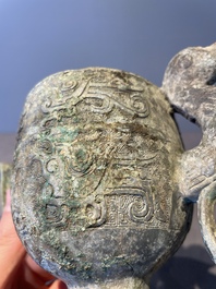 Three Chinese archaic bronze wine vessels, Zhou or later