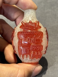 A group of seven Chinese red-overlay glass and red glass snuff bottles, 19/20th C.