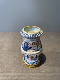 A pair of Chinese Imari-style casters or vases with gilt bronze mounts, Kangxi