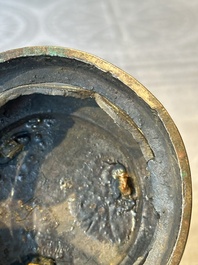 Two Chinese Chinese bronze cylindrical incense stick holders and a covered censer, Yuan/Ming and Qing