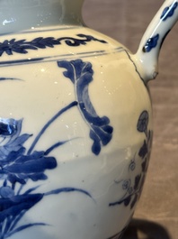 A Chinese blue and white vase with floral design and two handles, Transitional period