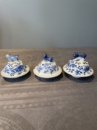 A Chinese blue and white garniture of five vases with lotus scrolls, 19th C.