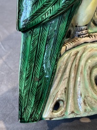 A pair of Chinese verte biscuit parrots, 19th C.