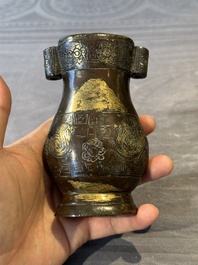 Four Chinese archaistic gilt bronze vases, Yuan/Ming