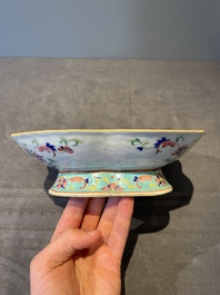 A Chinese blue, white and famille rose tea service, three famille rose bowls, a plate and a covered jar, 19th C.
