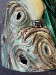 A pair of Chinese verte biscuit parrots, 19th C.