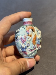 Six Chinese moulded famille rose snuff bottles, Qianlong mark, 19th C.